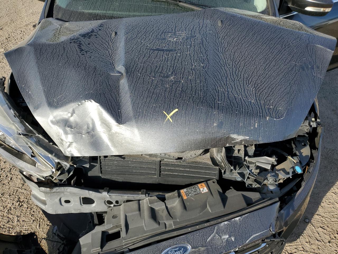 2016 Ford Focus Titanium VIN: 1FADP3J25GL312604 Lot: 85146455