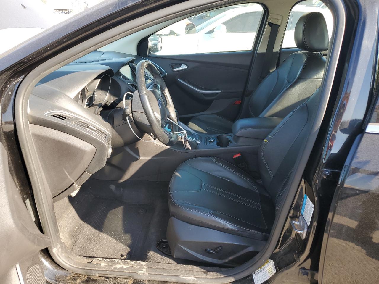 2014 Ford Focus Titanium VIN: 1FADP3J2XEL161594 Lot: 82163935