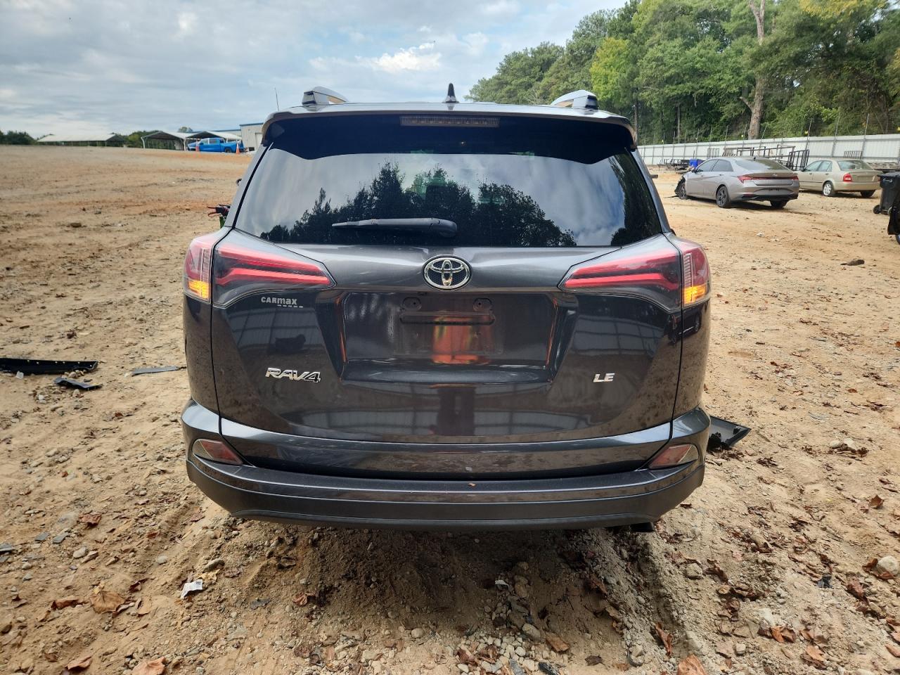 2018 Toyota Rav4 Le VIN: JTMZFREV8JJ209755 Lot: 82346475