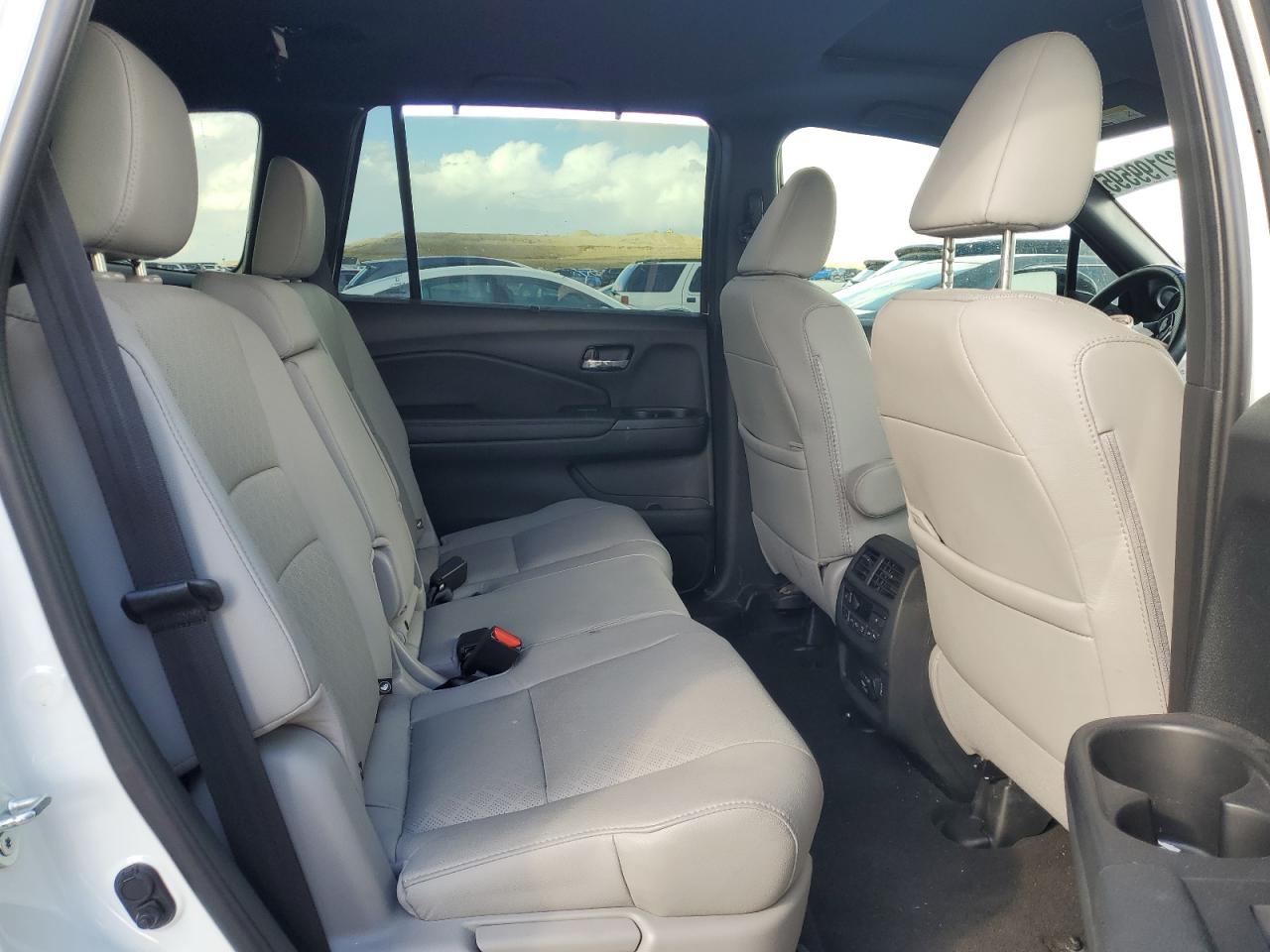 2021 Honda Passport Elite VIN: 5FNYF8H02MB039538 Lot: 82199595