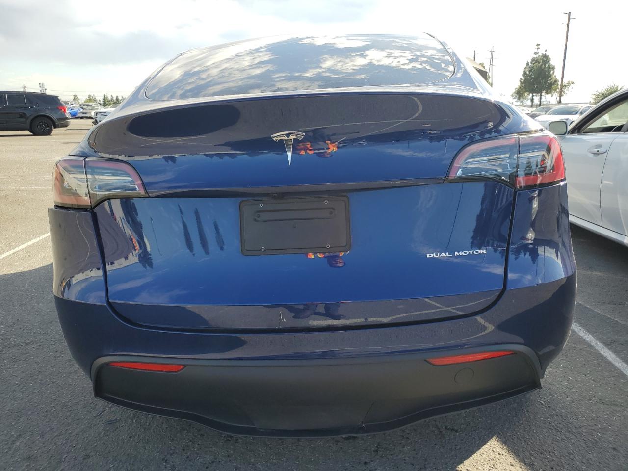 2023 Tesla Model Y VIN: 7SAYGDEE4PA123225 Lot: 82621445
