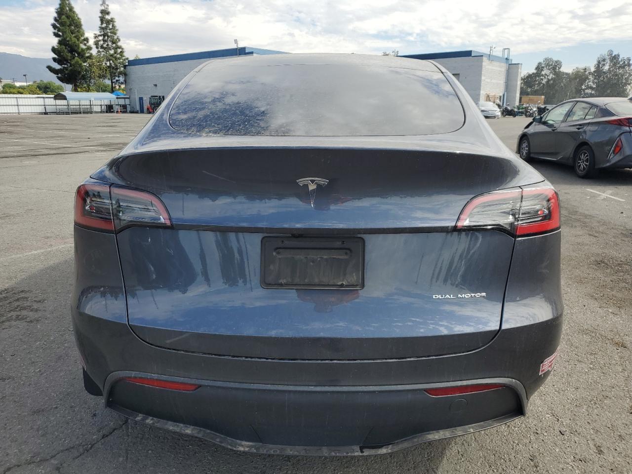 2023 Tesla Model Y VIN: 7SAYGDEE8PA208097 Lot: 84441595