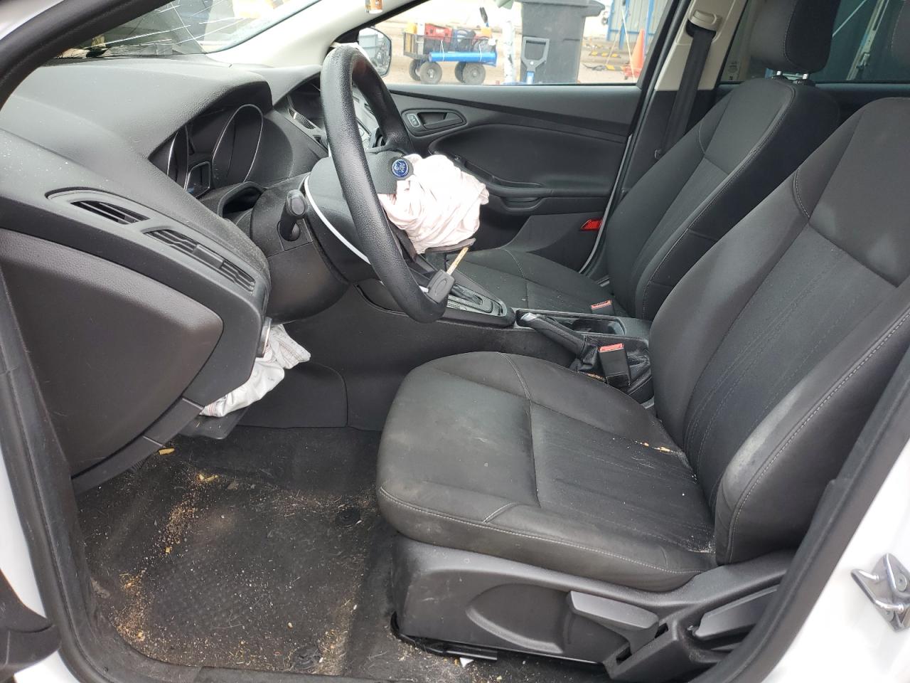 2015 Ford Focus S VIN: 1FADP3E24FL221235 Lot: 82374575