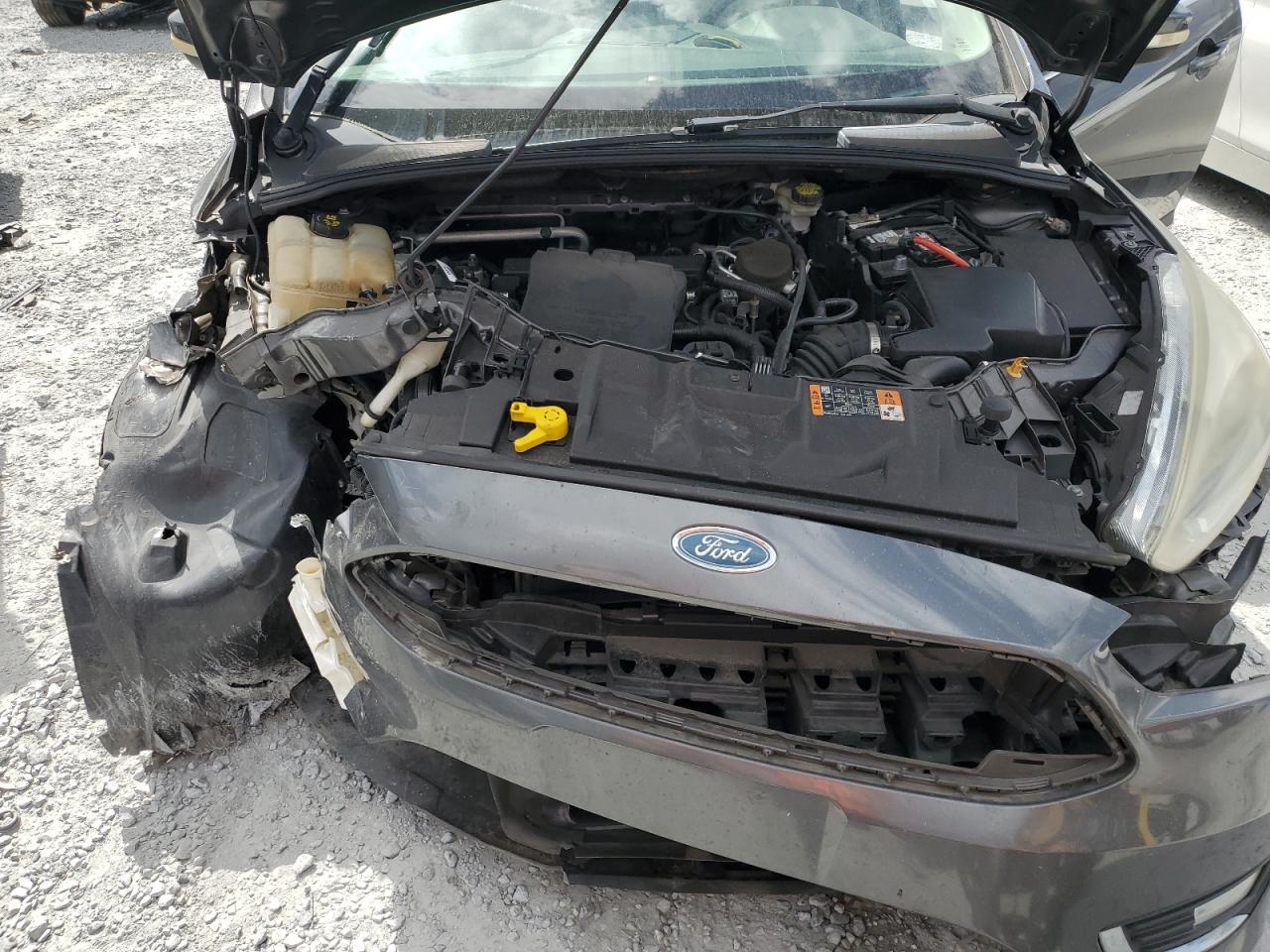 2015 Ford Focus Titanium VIN: 1FADP3J27FL322047 Lot: 82182475