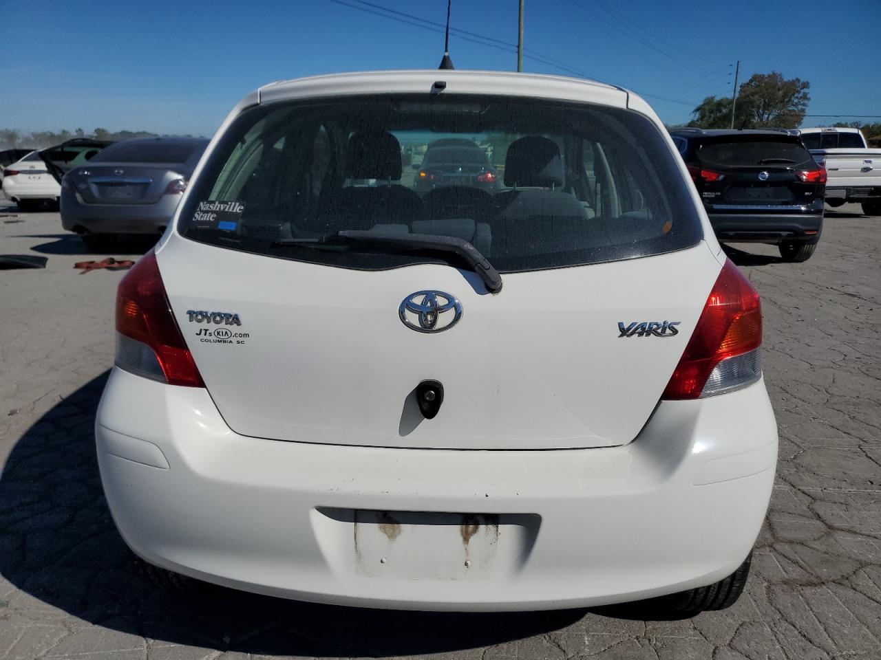 2009 Toyota Yaris VIN: JTDKT903495243325 Lot: 84933435