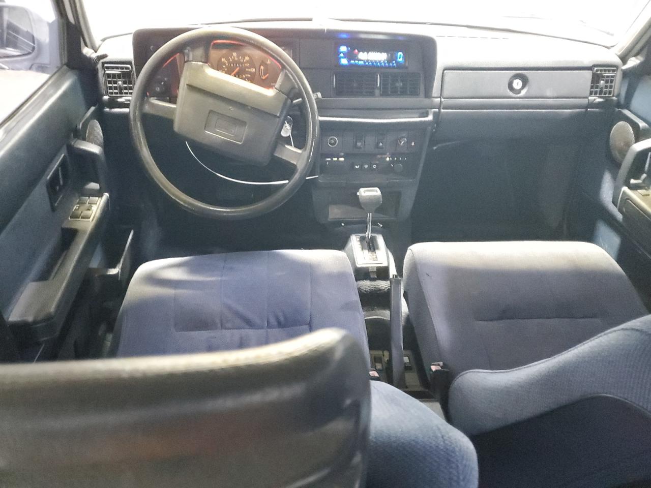 1990 Volvo 240 Base VIN: YV1AA8840L1425573 Lot: 85182375