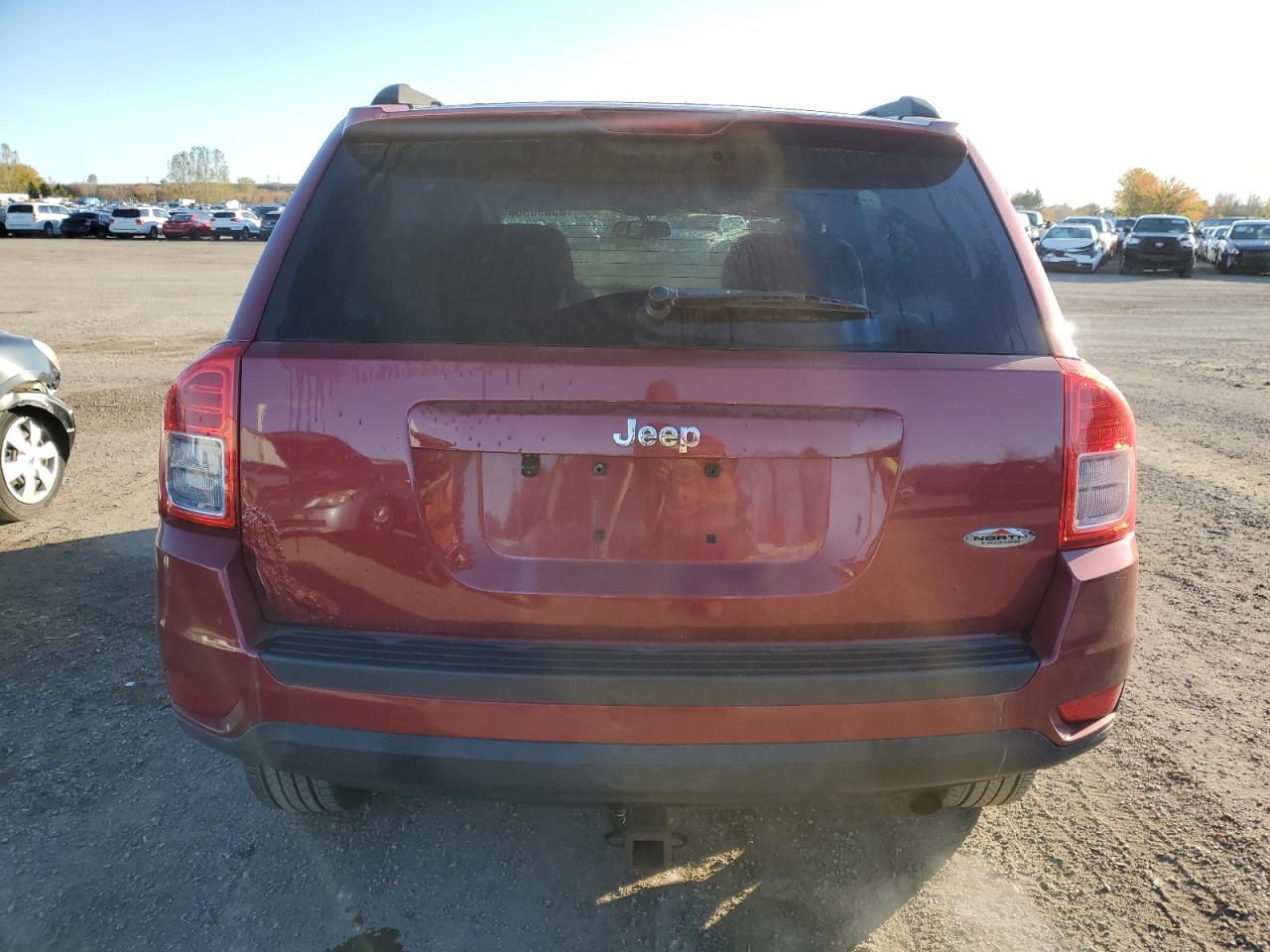 2012 Jeep Compass VIN: 1C4NJCAB4CD570956 Lot: 85690565