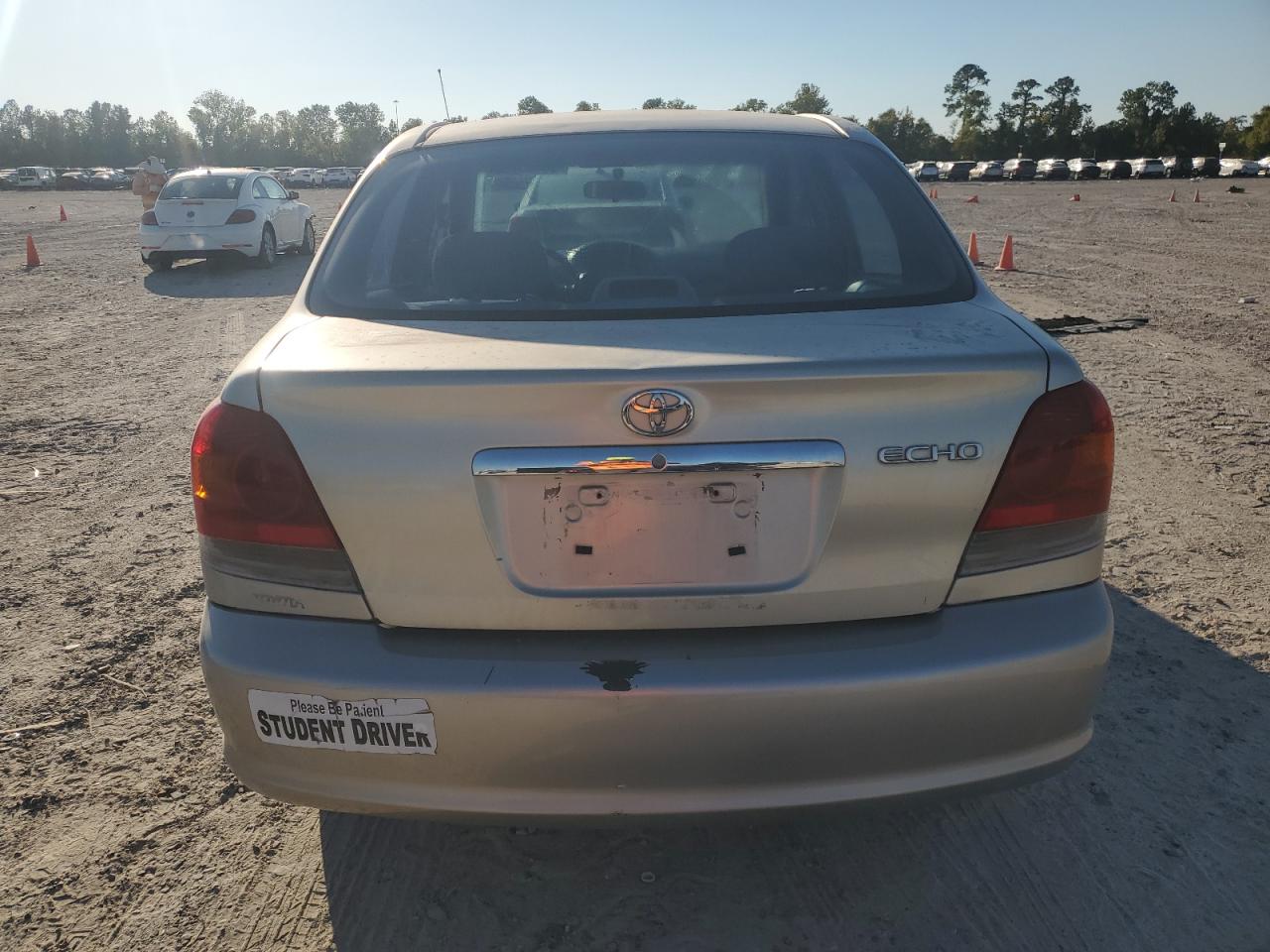 2003 Toyota Echo VIN: JTDBT123730276127 Lot: 86483795