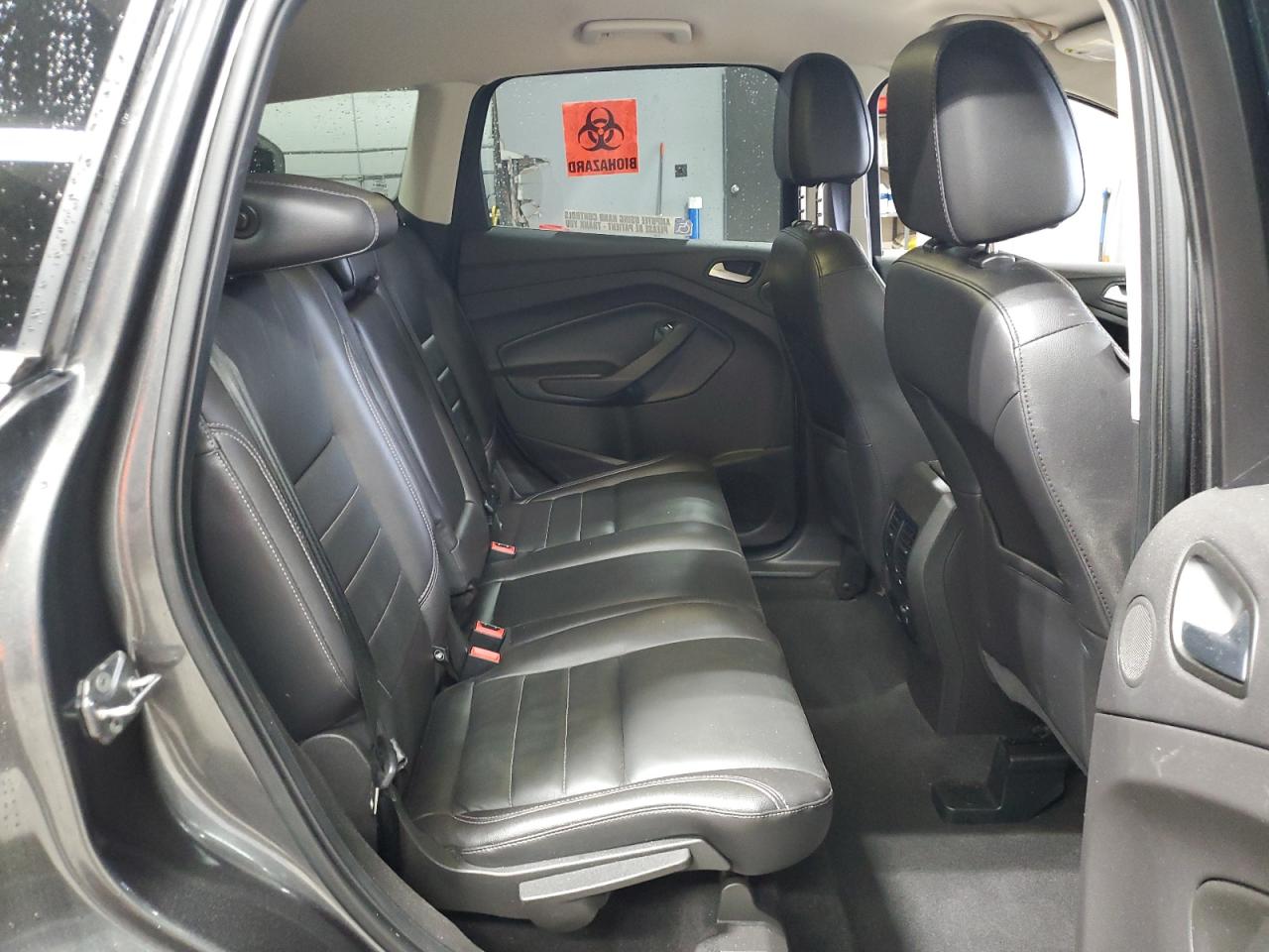 2016 Ford Escape Titanium VIN: 1FMCU0J96GUB91100 Lot: 82514625