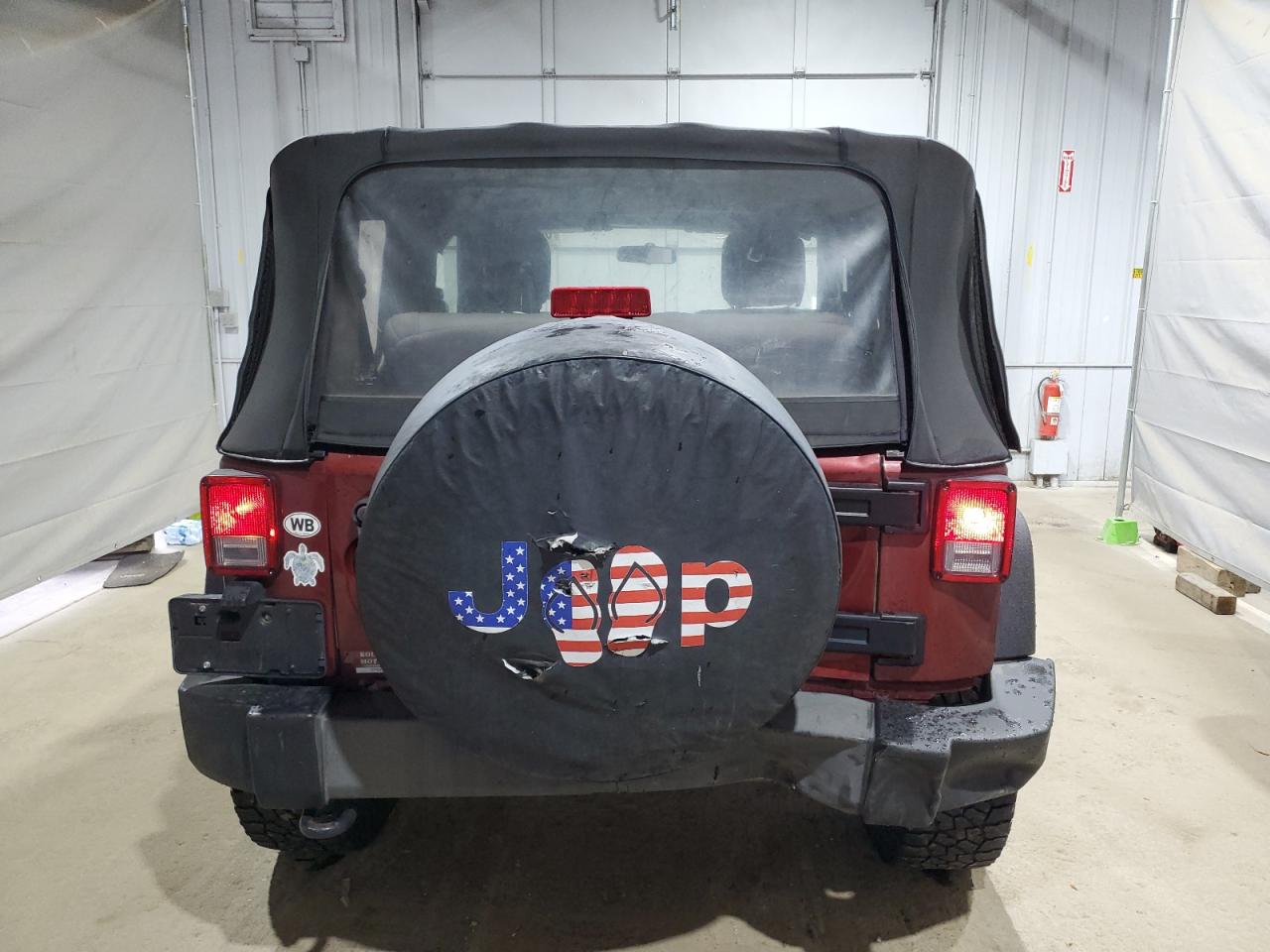 2010 Jeep Wrangler Sport VIN: 1J4AA2D15AL176469 Lot: 85846285