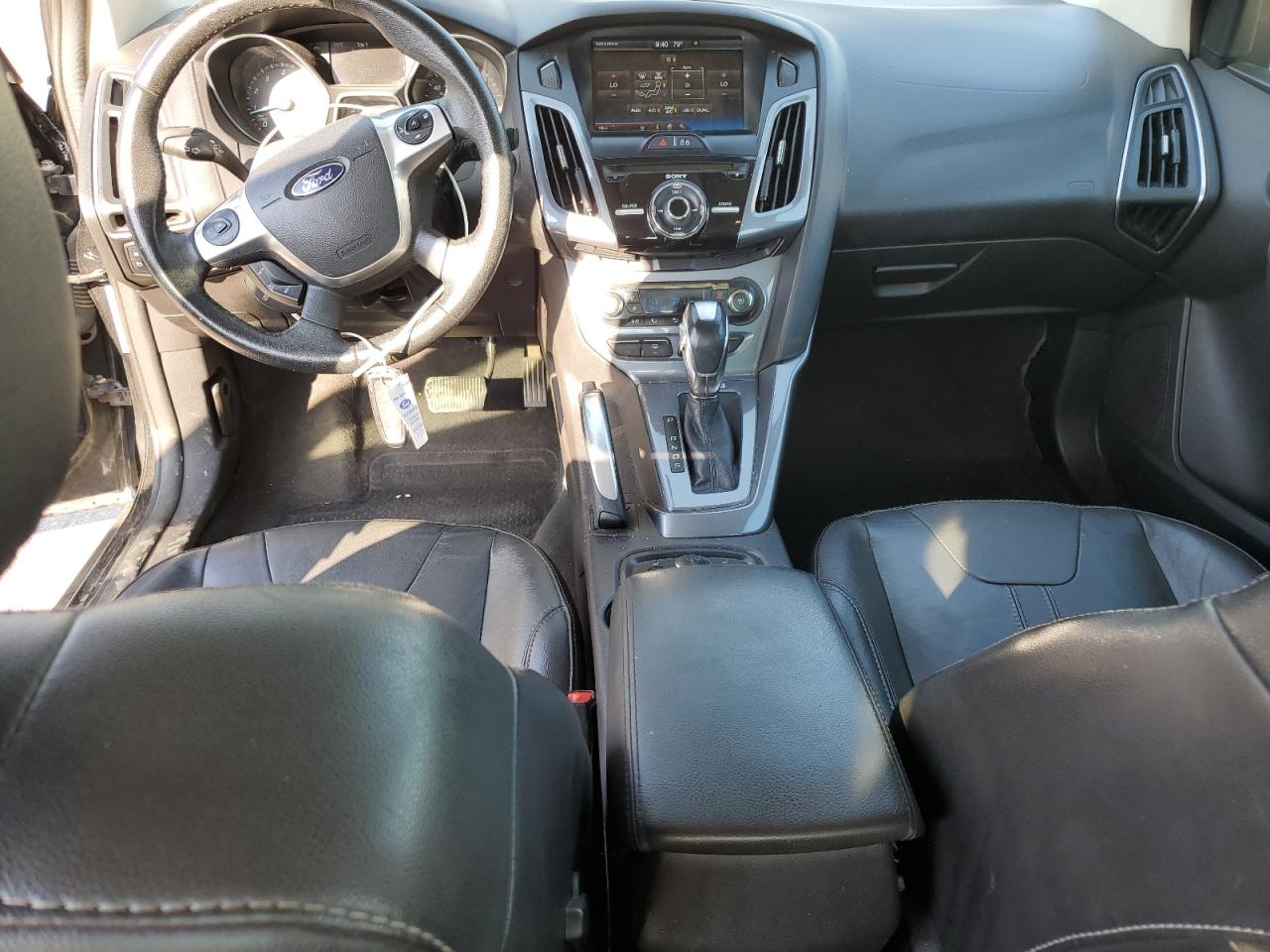 2014 Ford Focus Titanium VIN: 1FADP3J2XEL161594 Lot: 82163935