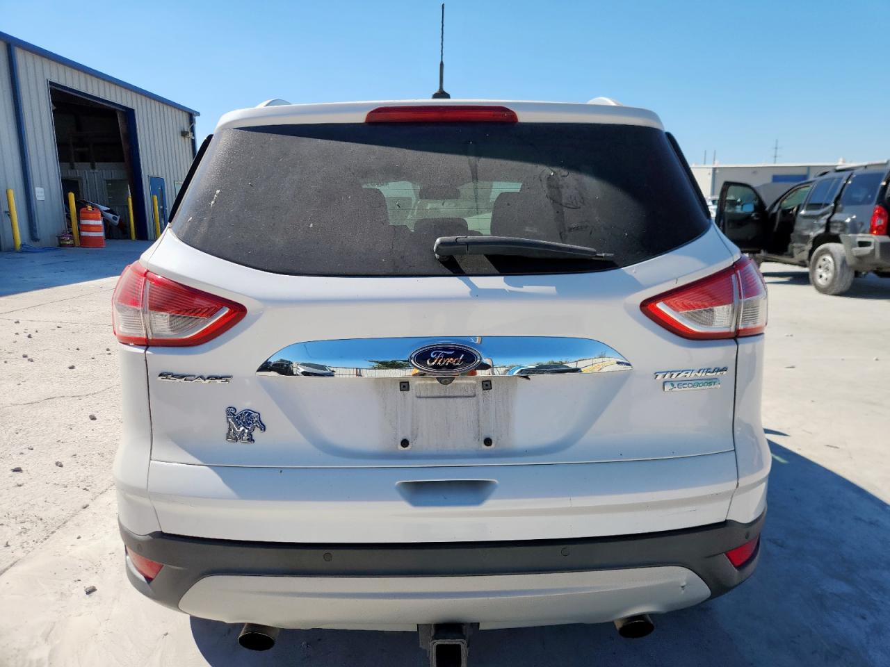 2016 Ford Escape Titanium VIN: 1FMCU0J98GUC91019 Lot: 82394715