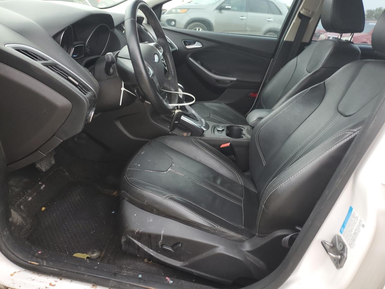 2013 Ford Focus Titanium VIN: 1FADP3J29DL296368 Lot: 82347275