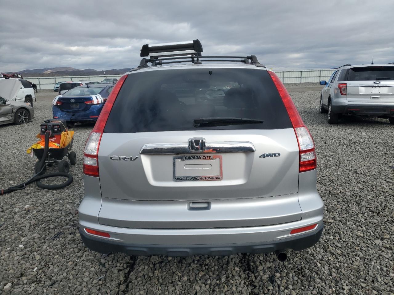 2010 Honda Cr-V Exl VIN: JHLRE4H75AC009409 Lot: 82531335