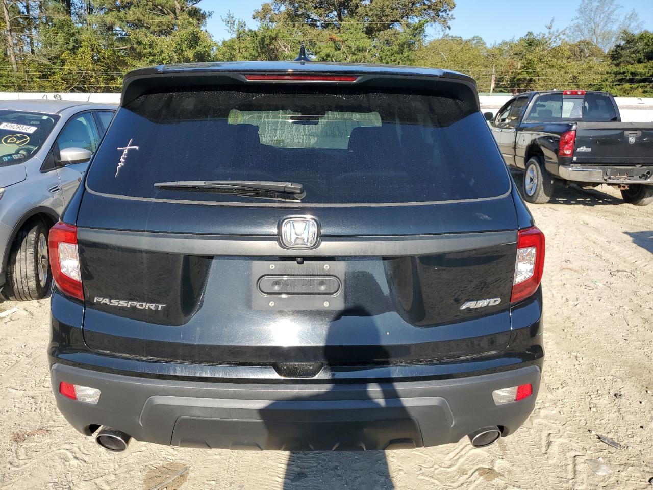 2021 Honda Passport Exl VIN: 5FNYF8H54MB031033 Lot: 82260755