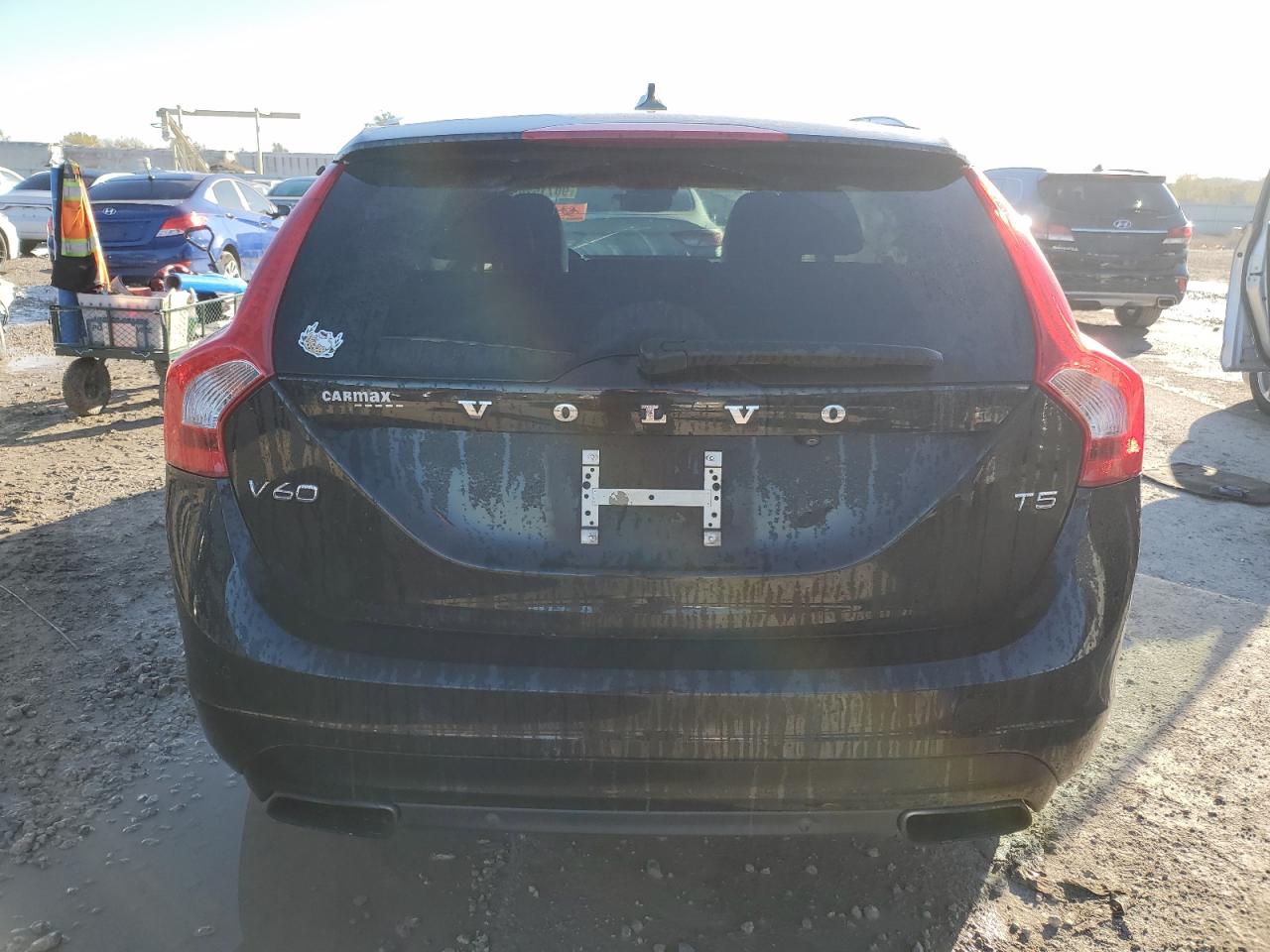 2015 Volvo V60 Premier VIN: YV140MEKXF1222061 Lot: 90715205