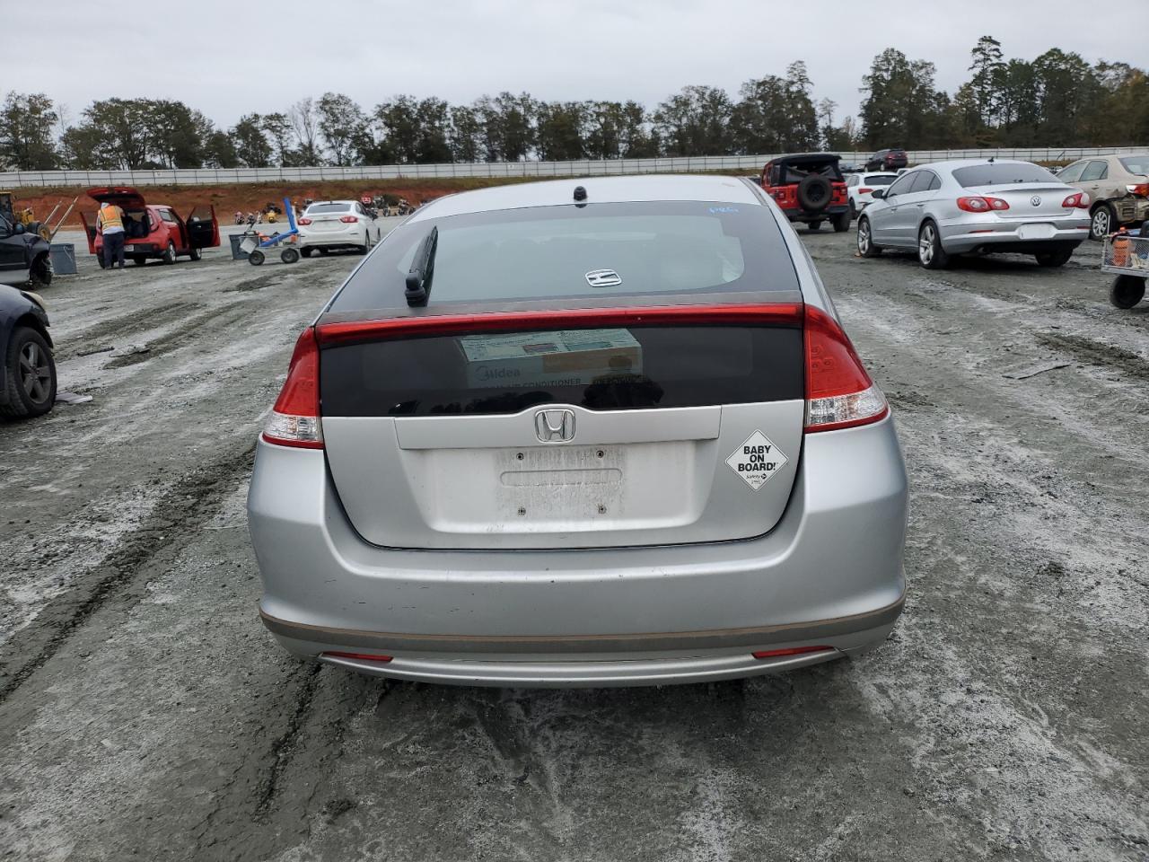 2010 Honda Insight Ex VIN: JHMZE2H74AS001579 Lot: 90097255