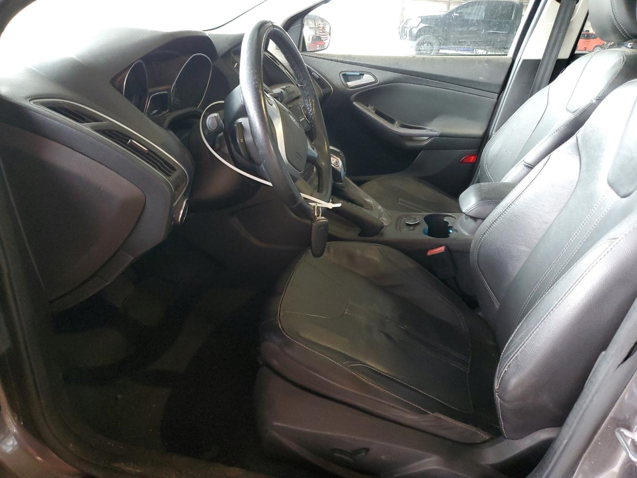 2014 Ford Focus Titanium VIN: 1FADP3J21EL300155 Lot: 86535845