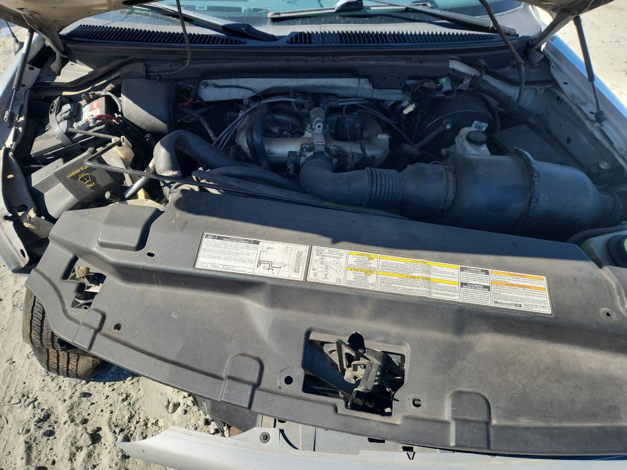 1999 Ford F150 VIN: 1FTZX1723XNA62201 Lot: 82415335