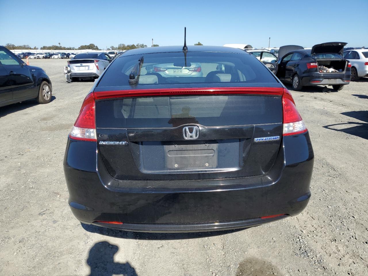2010 Honda Insight Ex VIN: JHMZE2H70AS026995 Lot: 87298675