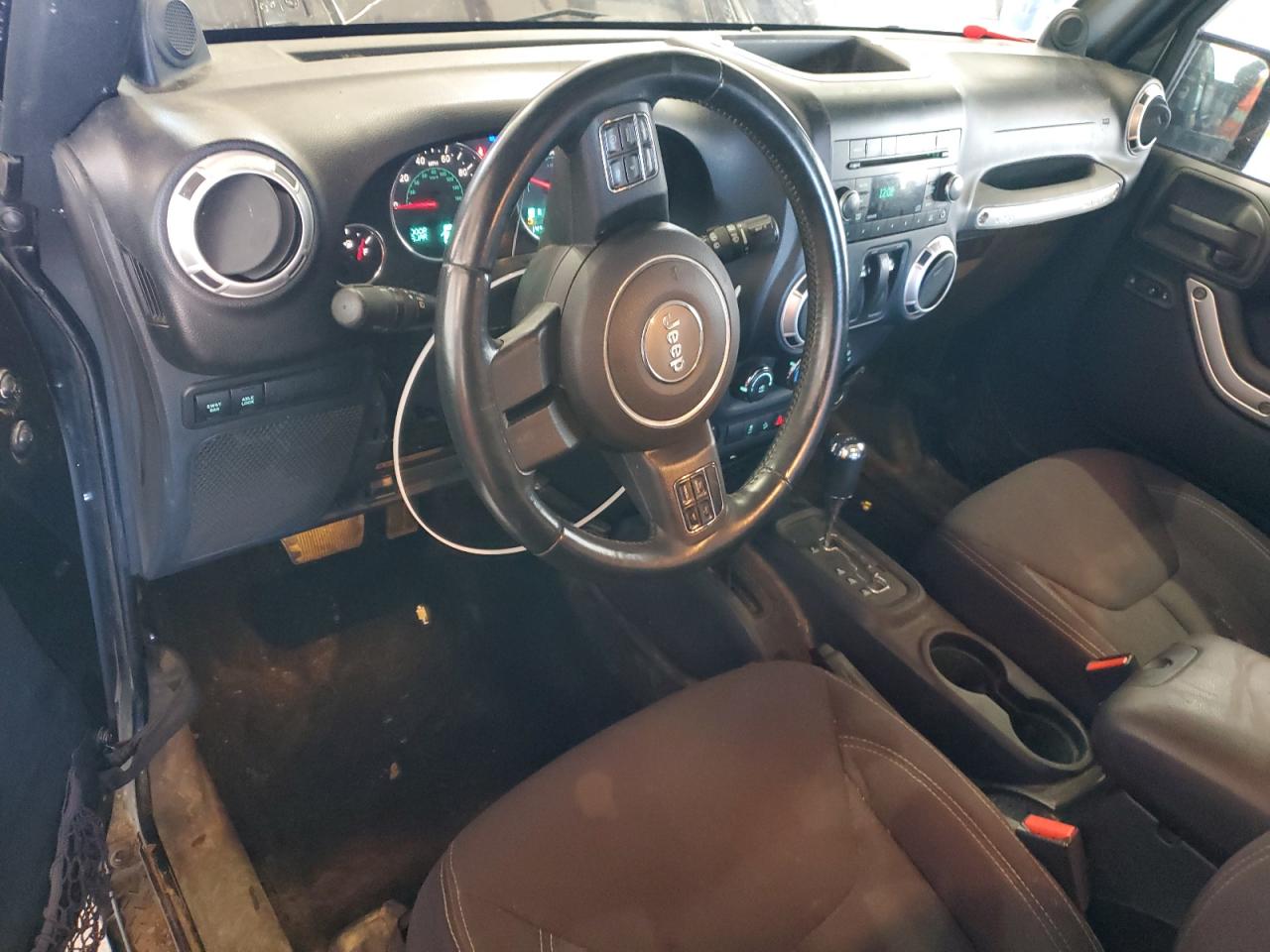 2013 Jeep Wrangler Rubicon VIN: 1C4BJWCGXDL557343 Lot: 85390665