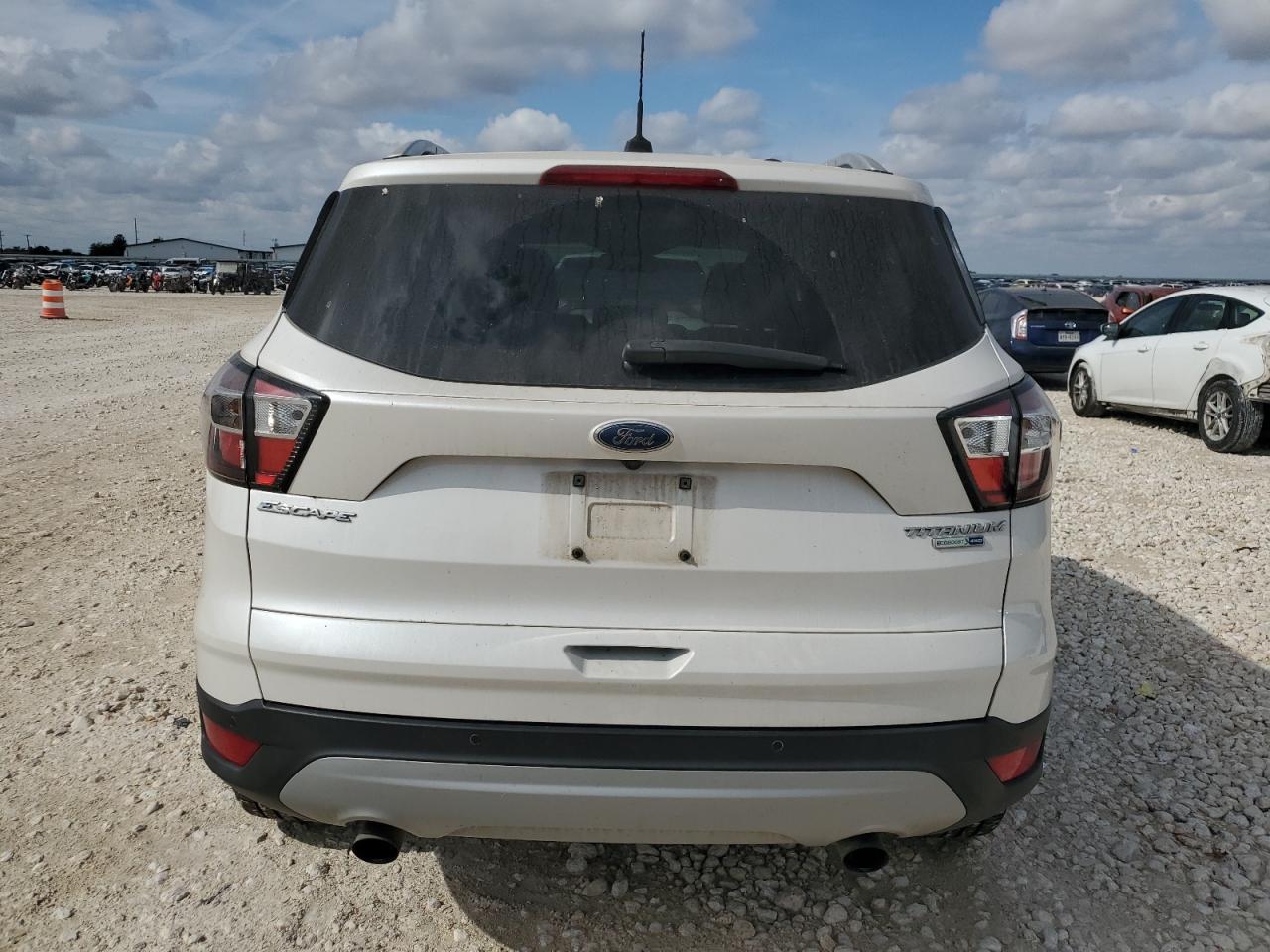 2017 Ford Escape Titanium VIN: 1FMCU9JD4HUB38826 Lot: 89816575