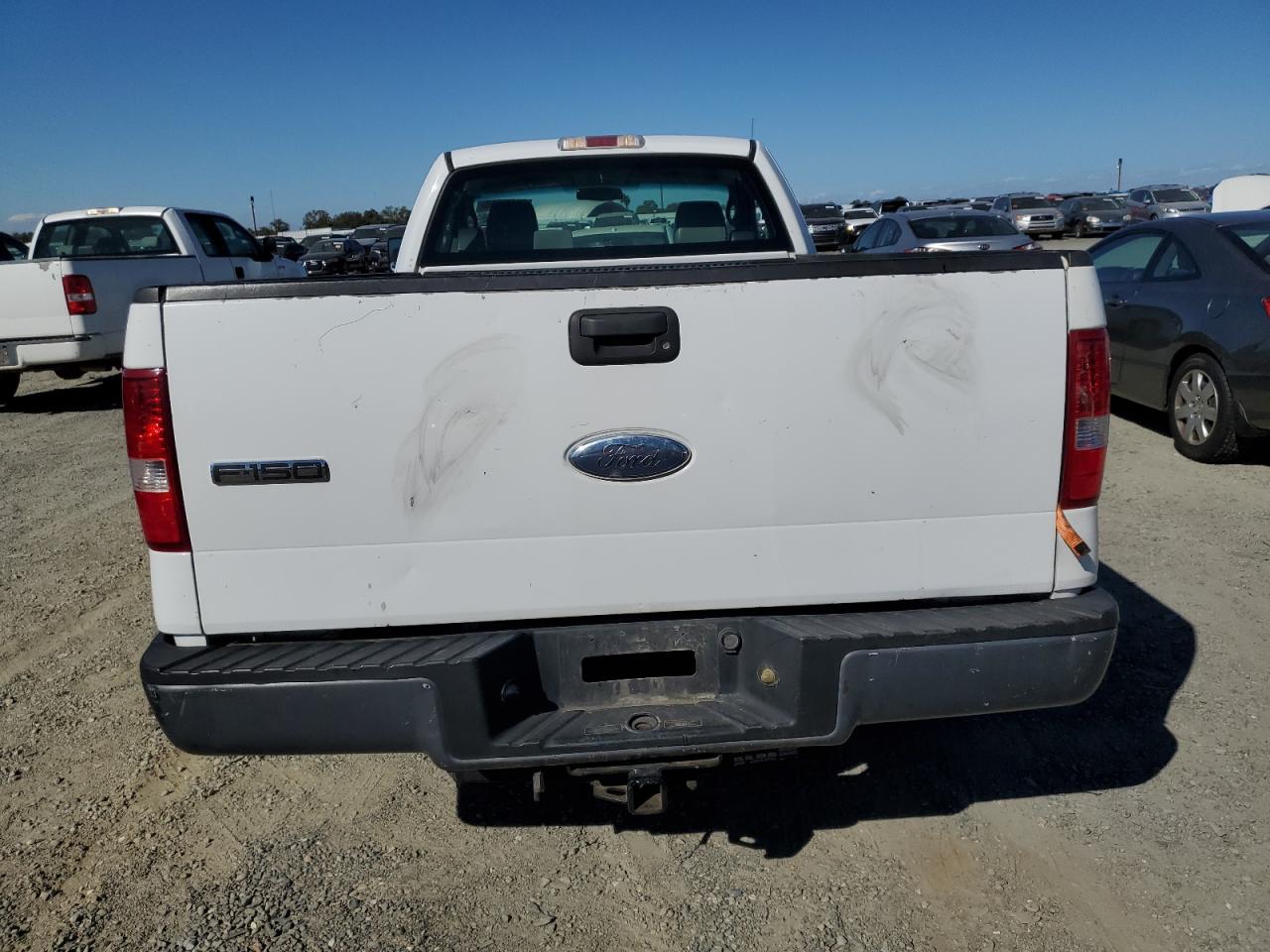 2007 Ford F150 VIN: 1FTRF12277NA10256 Lot: 82405955
