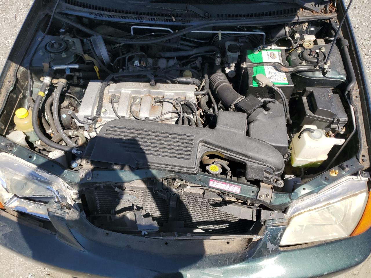 1999 Mazda Protege Es VIN: JM1BJ2214X0139596 Lot: 85183855