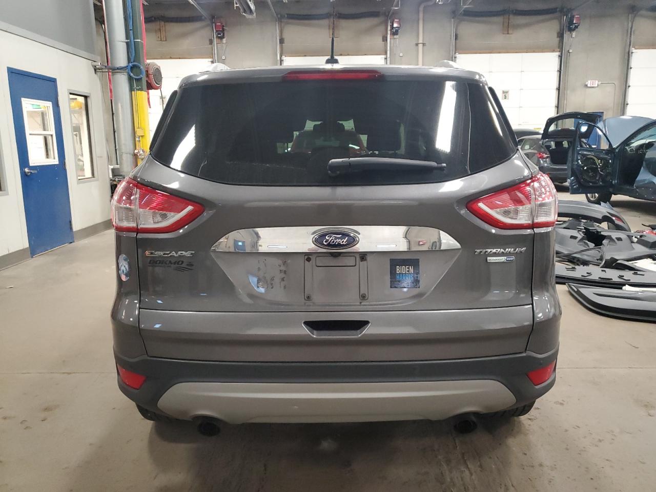 2014 Ford Escape Titanium VIN: 1FMCU9JXXEUB16982 Lot: 82258075