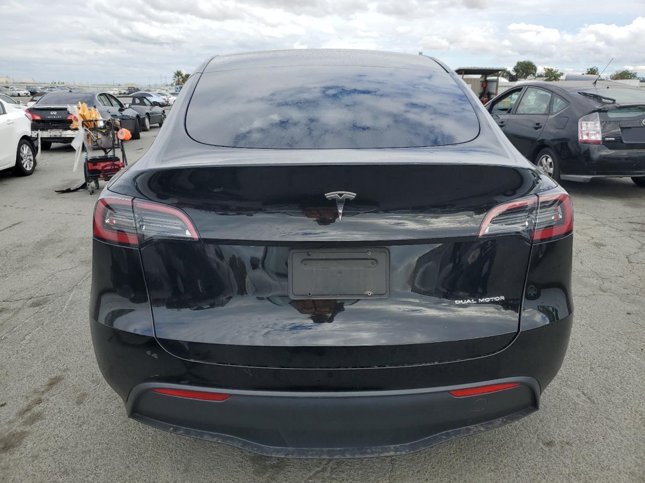 2023 Tesla Model Y VIN: 7SAYGAEE9PF715124 Lot: 84266665