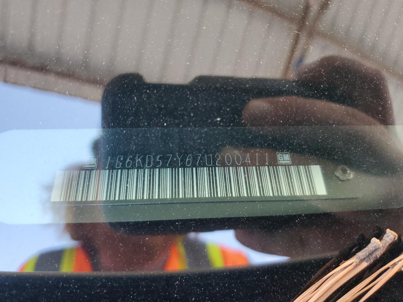 2007 Cadillac Dts VIN: 1G6KD57Y67U200411 Lot: 85261215