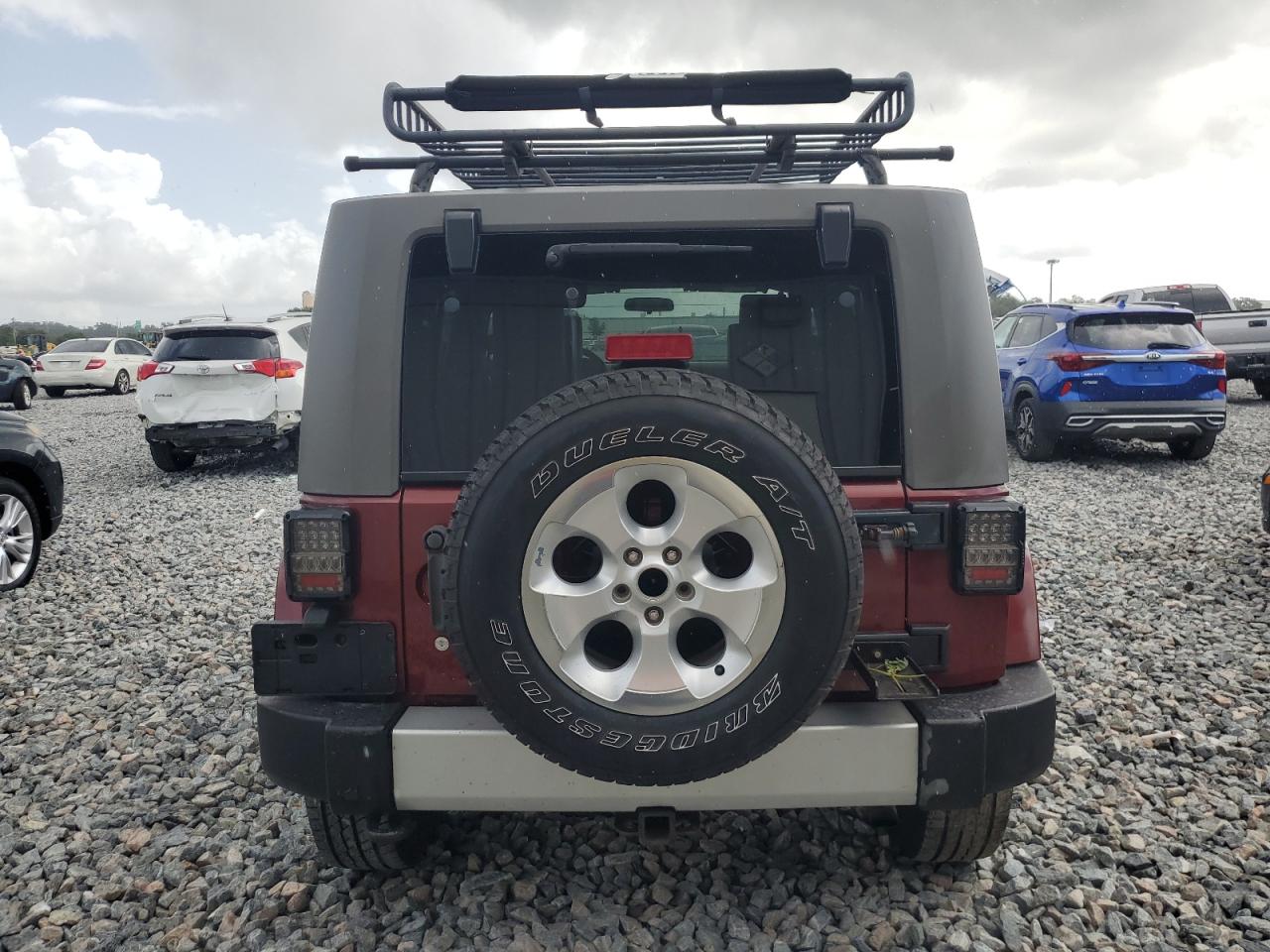 2009 Jeep Wrangler Unlimited Sahara VIN: 1J4GA59199L771647 Lot: 84899905