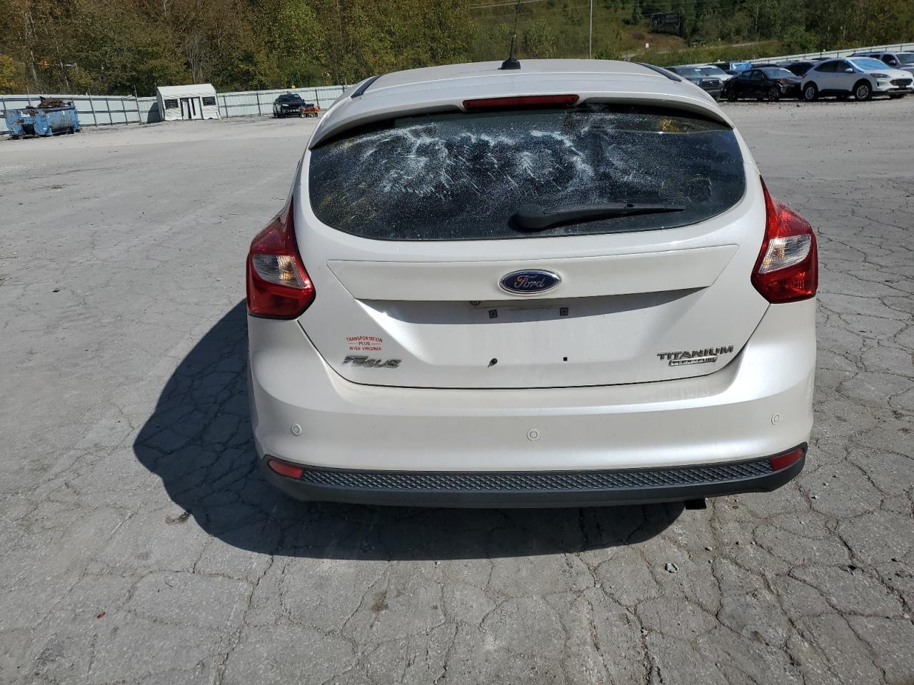 2013 Ford Focus Titanium VIN: 1FADP3N27DL181584 Lot: 82507925