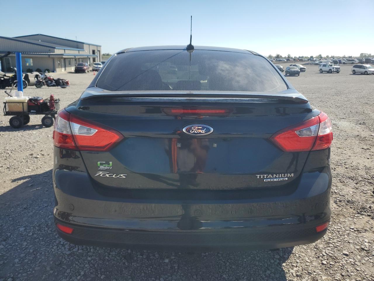 2013 Ford Focus Titanium VIN: 1FADP3J21DL270671 Lot: 86302005