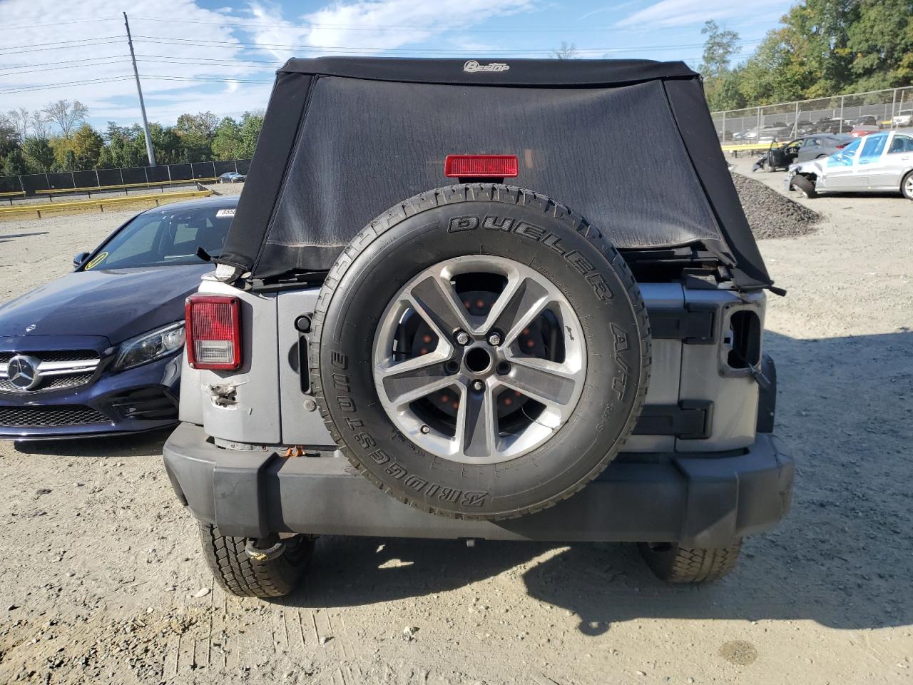 2014 Jeep Wrangler Unlimited Sport VIN: 1C4BJWDG9EL251699 Lot: 85539535