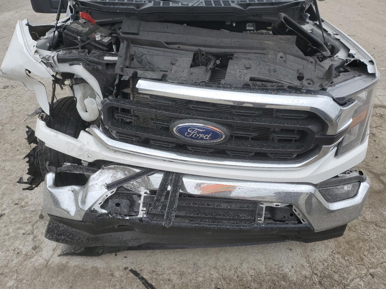 2023 Ford F150 VIN: 1FTMF1C58PKE22075 Lot: 82773595