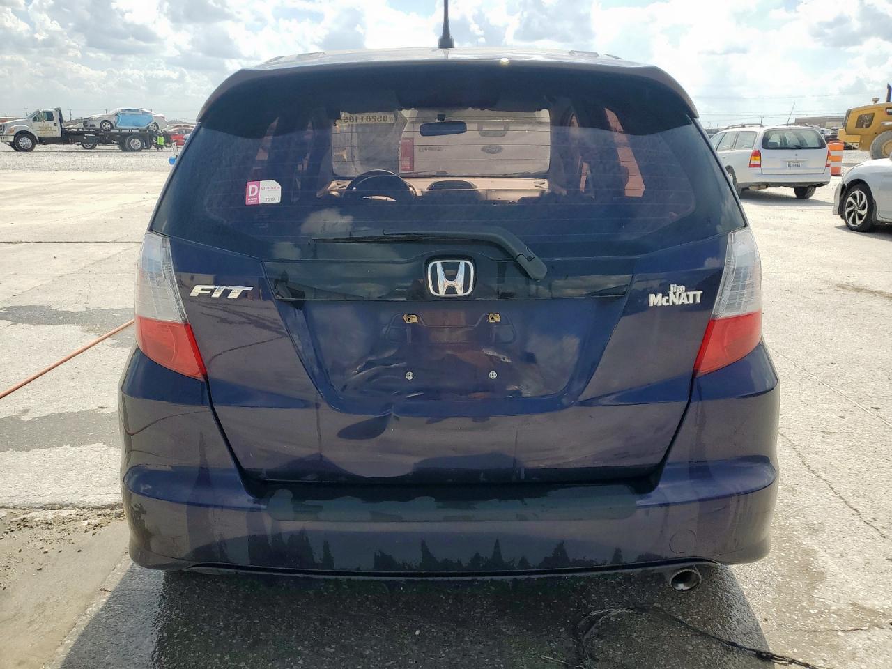 2009 Honda Fit Sport VIN: JHMGE88479S038797 Lot: 85281105