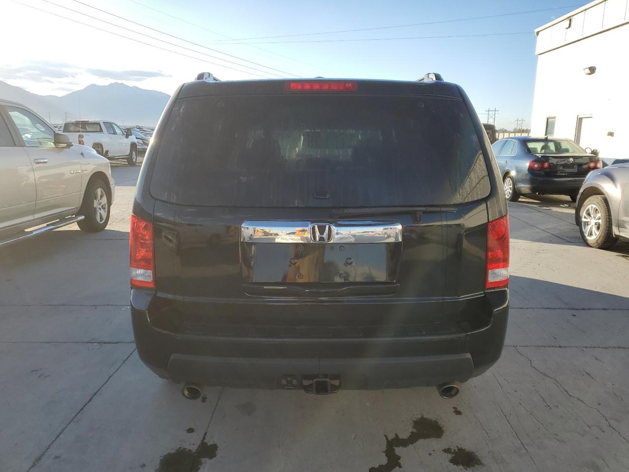 2011 Honda Pilot Ex VIN: 5FNYF4H4XBB057911 Lot: 82383695