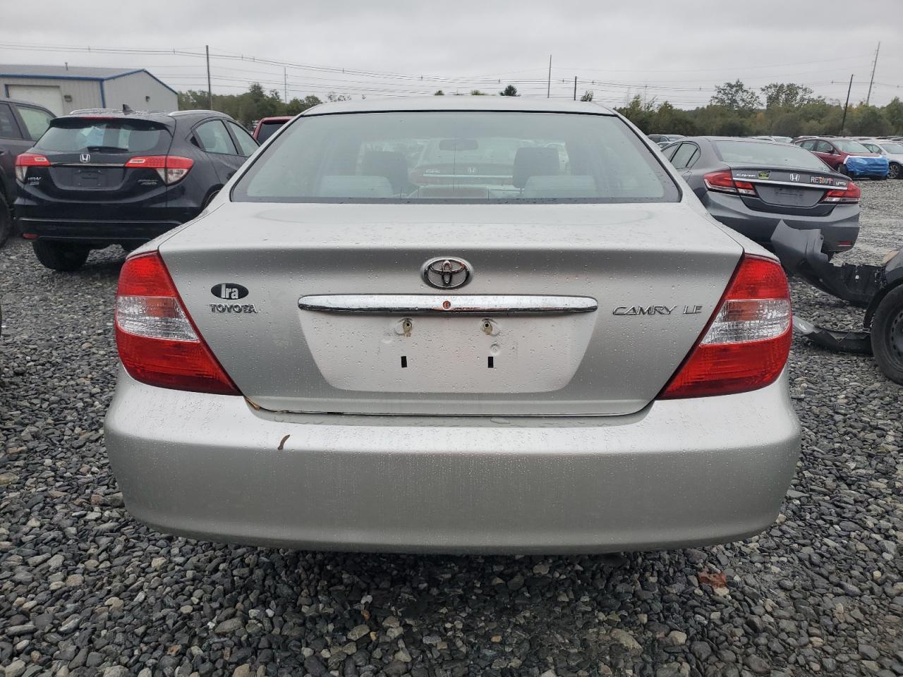 2003 Toyota Camry Le VIN: 4T1BE32K13U764703 Lot: 86055455