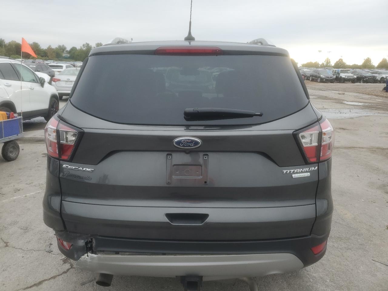 2018 Ford Escape Titanium VIN: 1FMCU0J9XJUD43869 Lot: 90223335