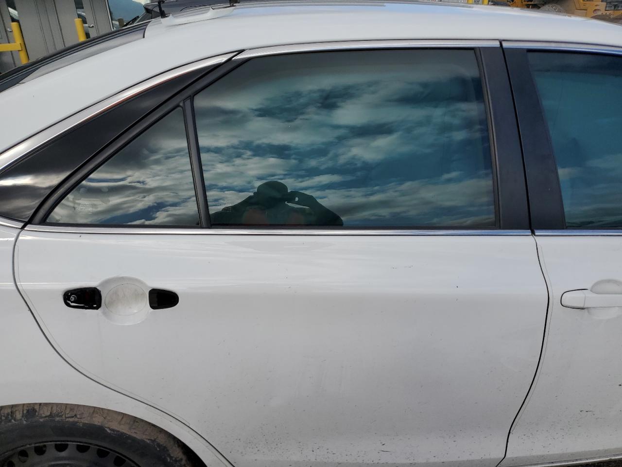 2015 Toyota Camry Le VIN: 995299 Lot: 86592845