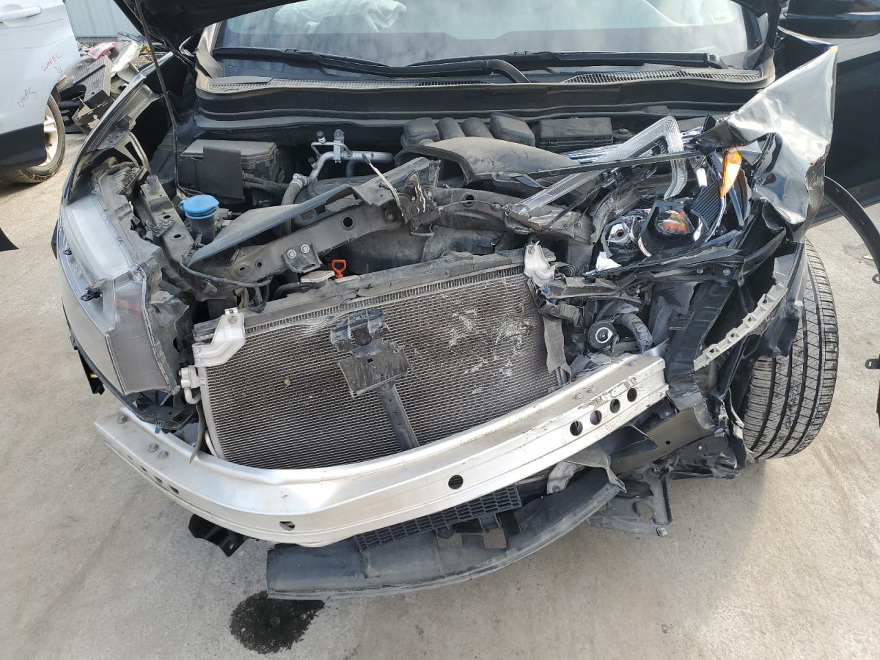 2022 Honda Passport Elite VIN: 5FNYF8H04NB000290 Lot: 87049905