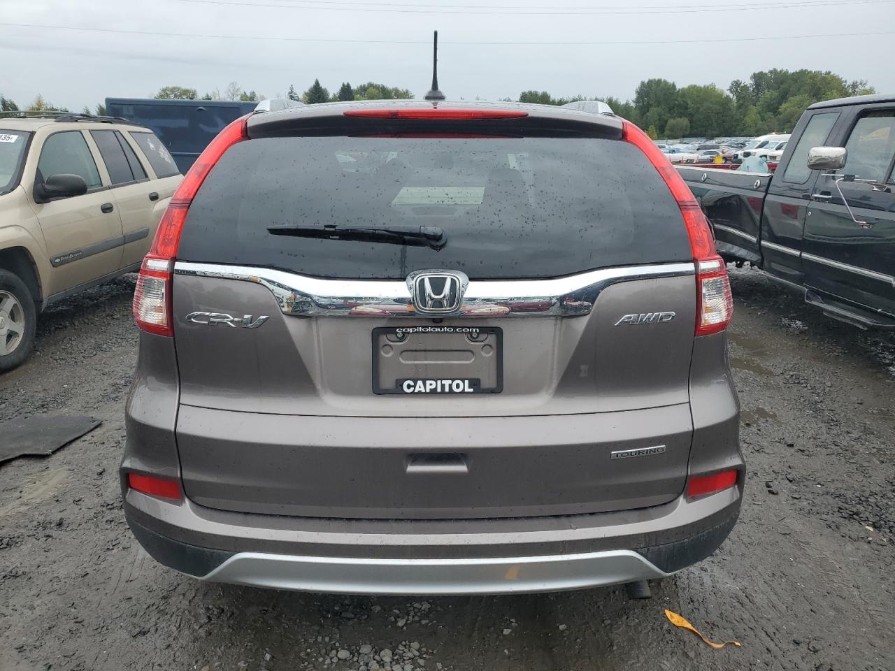 2016 Honda Cr-V Touring VIN: 5J6RM4H90GL134001 Lot: 84646435
