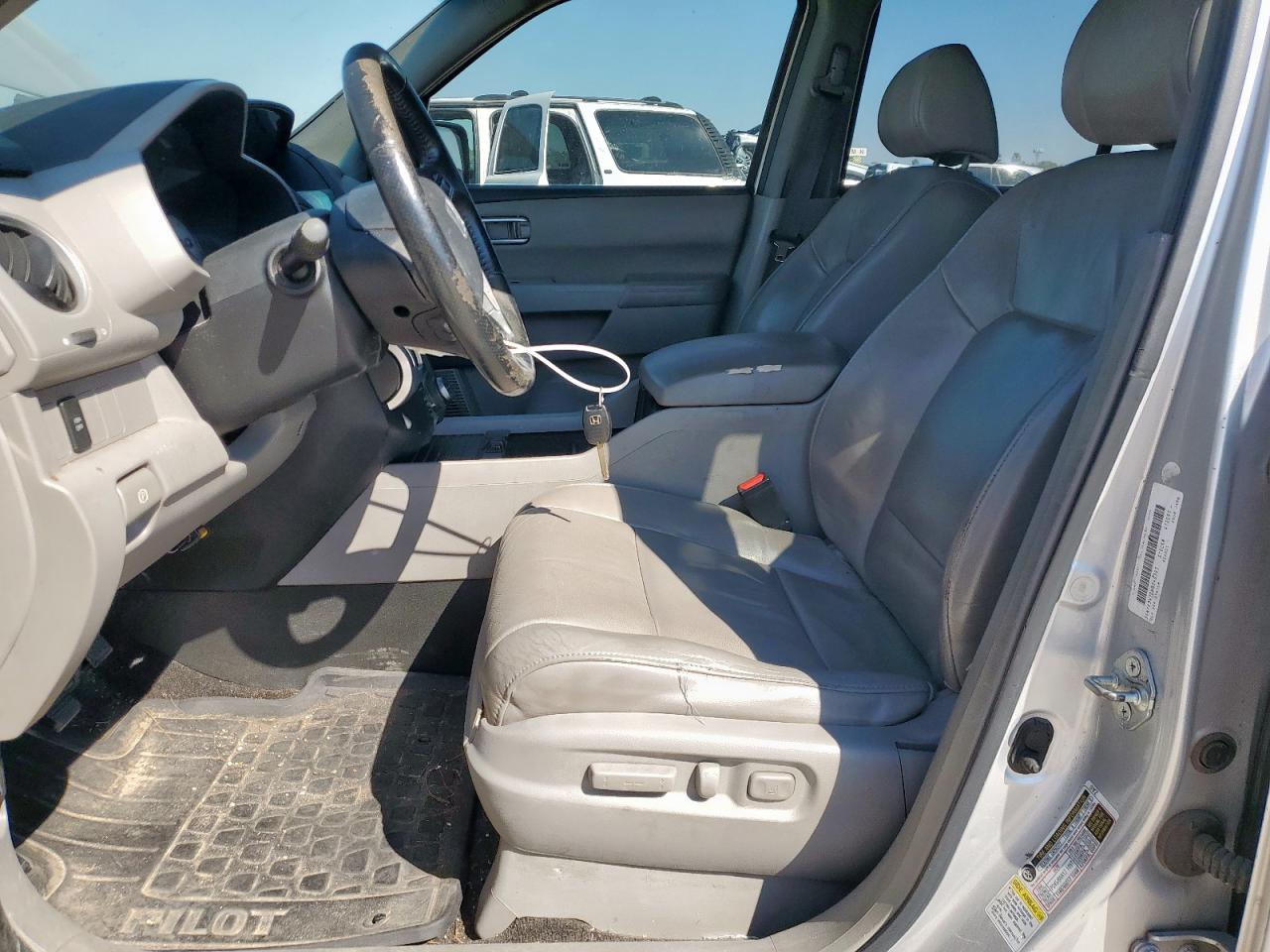 2011 Honda Pilot Exln VIN: 5FNYF3H70BB040393 Lot: 86651695