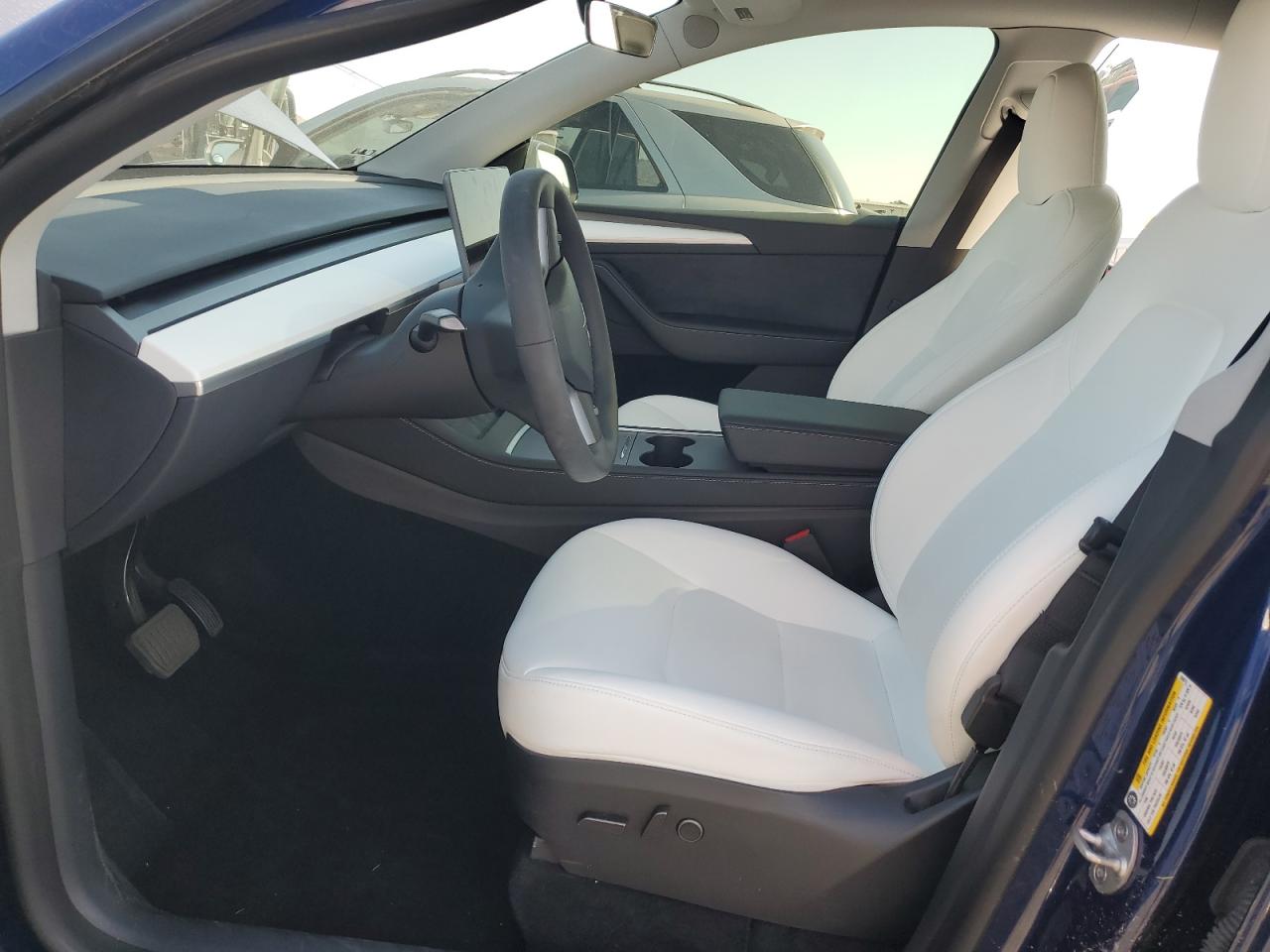 2023 Tesla Model Y VIN: 7SAYGDEE6PA058975 Lot: 85126905