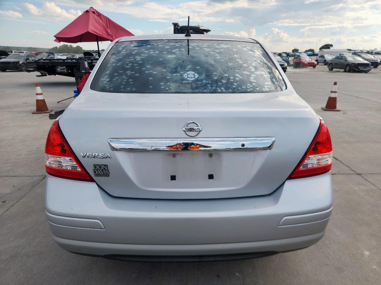 2009 Nissan Versa S VIN: 3N1BC11E09L445986 Lot: 85884035