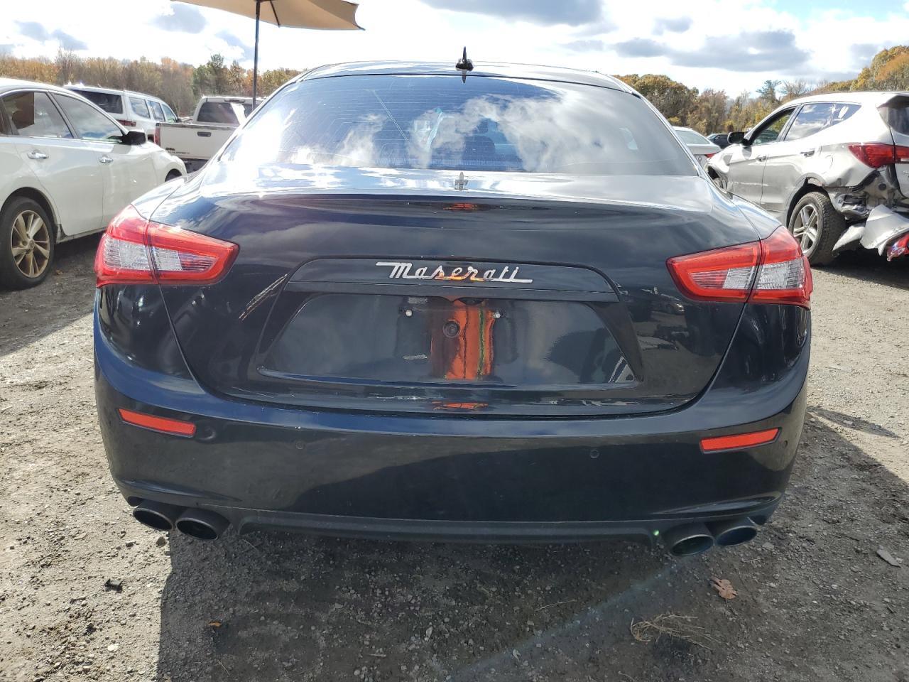 2014 Maserati Ghibli S VIN: ZAM57RTA8E1107689 Lot: 90661325