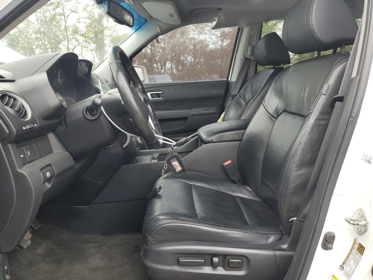 2011 Honda Pilot Touring VIN: 5FNYF4H96BB061112 Lot: 82473985