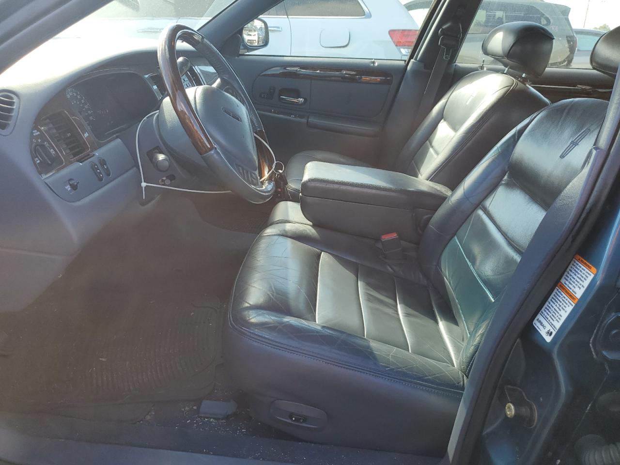 2001 Lincoln Town Car Signature VIN: 1LNHM82W11Y707761 Lot: 89661485