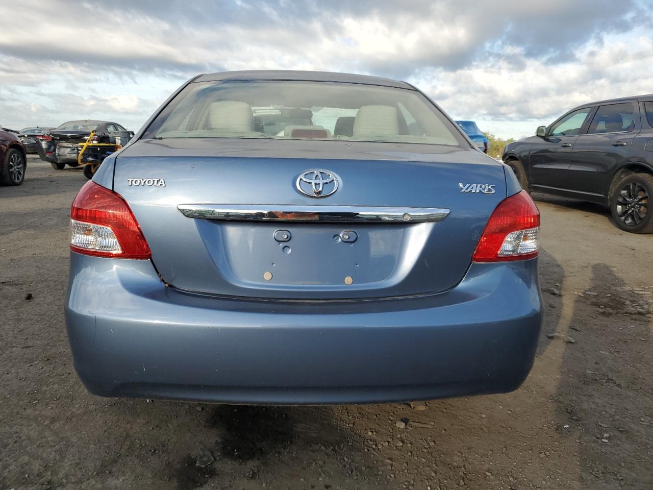 2011 Toyota Yaris VIN: JTDBT4K38B4081338 Lot: 85098905